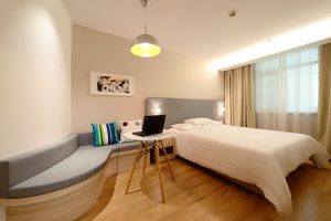 Bedroom with laptop on table
