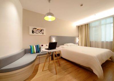 Bedroom with laptop on table