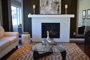Coffee table in front of fireplace